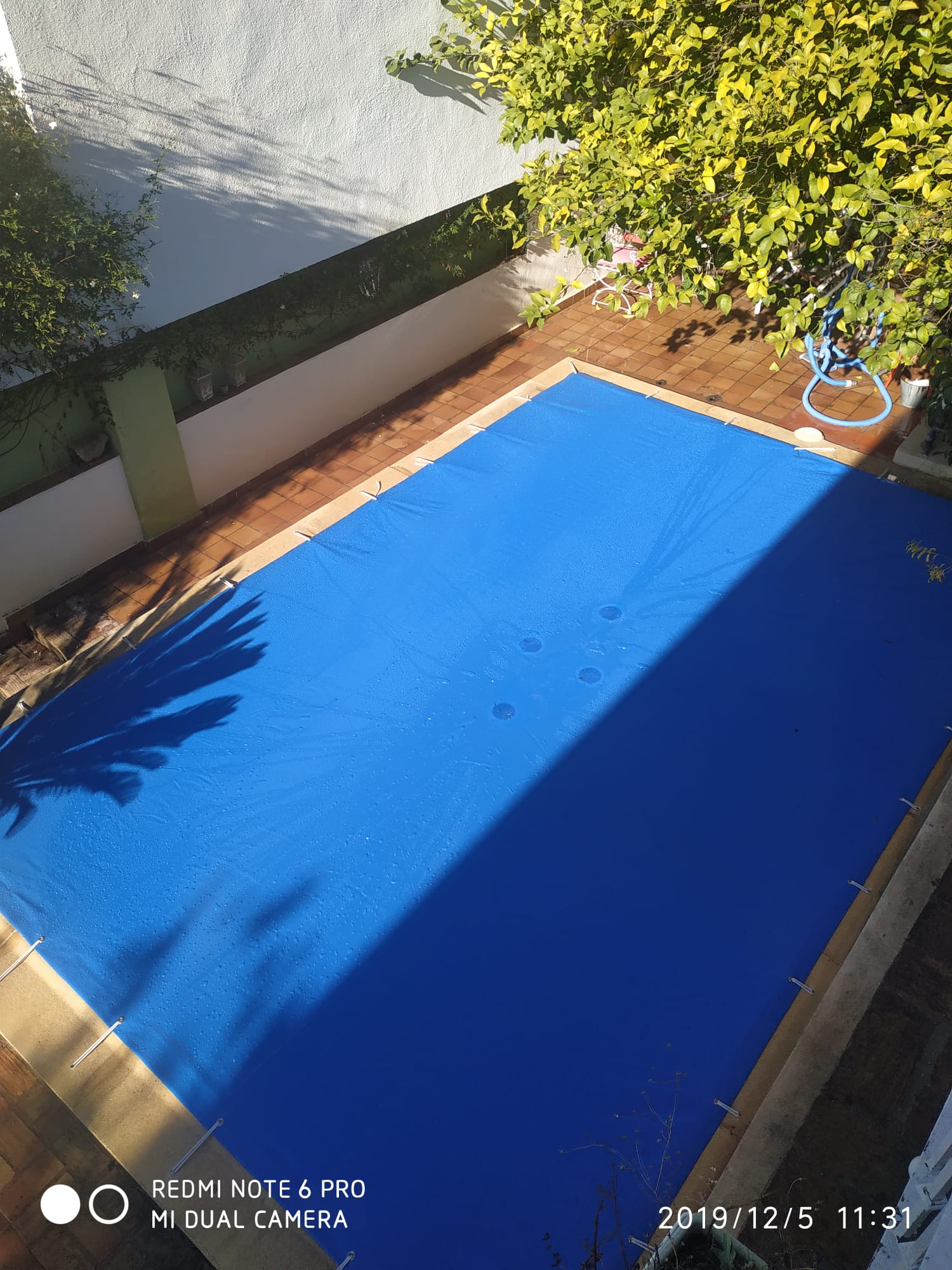 Piscina con terraza